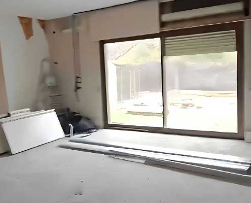 Salón en obras antes de la reforma integral realizada en chalet de Pozuelo de Alarcón
