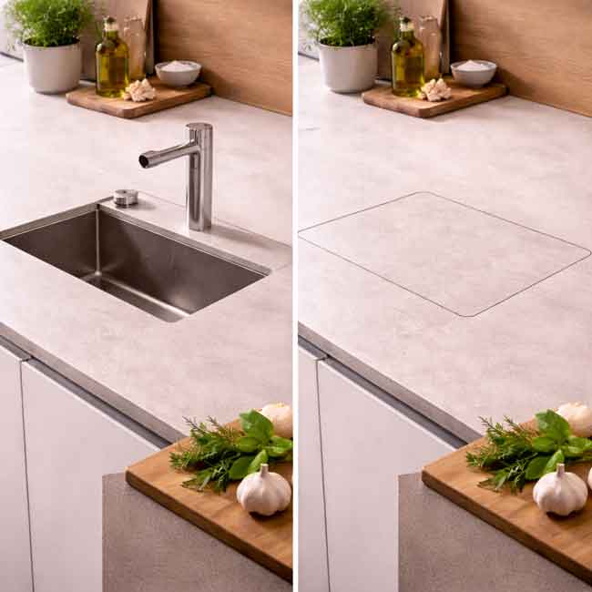 Grifería escamoteable y fregadero oculto para minimalismo total en cocinas